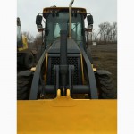 Погрузчик-экскаватор John Deere 325J